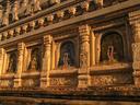 A Buddha in ever nook around the temple base.